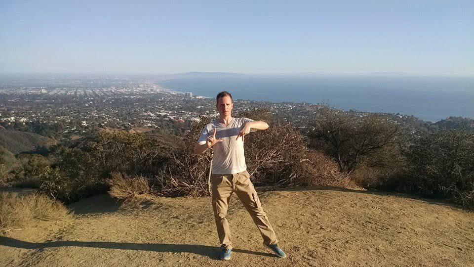 David DuVal on a hilltop overlooking the California coast near Santa Monica